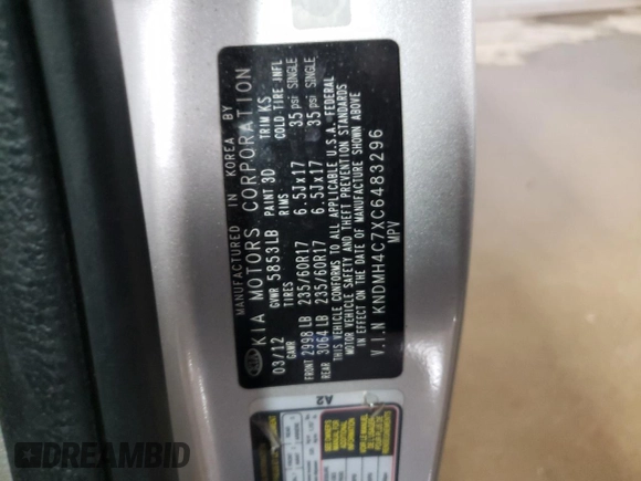 2012 Kia Sedona EX with VIN KNDMH4C7XC6483296, listed as a Copart auction lot 76624984 with 203,980 mi miles and Salvage Title. Bid and sale history available at carsss.com. Image 12.