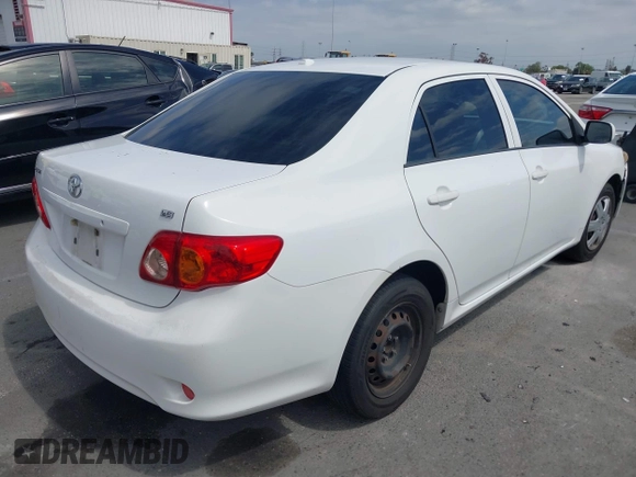 2009 Toyota Corolla with VIN JTDBL40E09J038659, listed as a IAAI auction lot 41889170 with 193,008 mi miles. Bid and sale history available at carsss.com. Image 4.