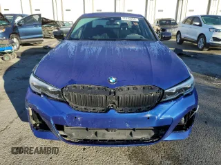2021 BMW 3 Series 330i xDrive with VIN 3MW5R7J0XM8C14425, listed as a Copart auction lot 72910854 with 9,465 mi miles and Salvage Title. Bid and sale history available at DreamBid. Image 5.