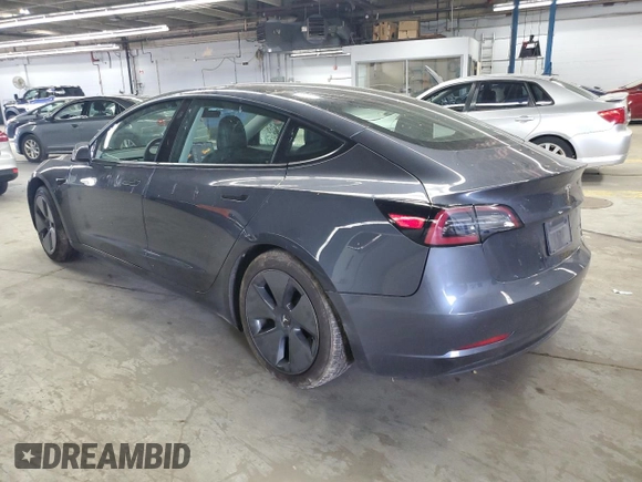 2021 Tesla Model 3 Long Range z VIN 5YJ3E1EB3MF848122, wystawiony jako Copart lot #56423005 z przebiegiem 57 619 mil mil oraz Szkoda całkowita • Salvage title. Historia ofert i sprzedaży dostępna na DreamBid. Obrazek 2.