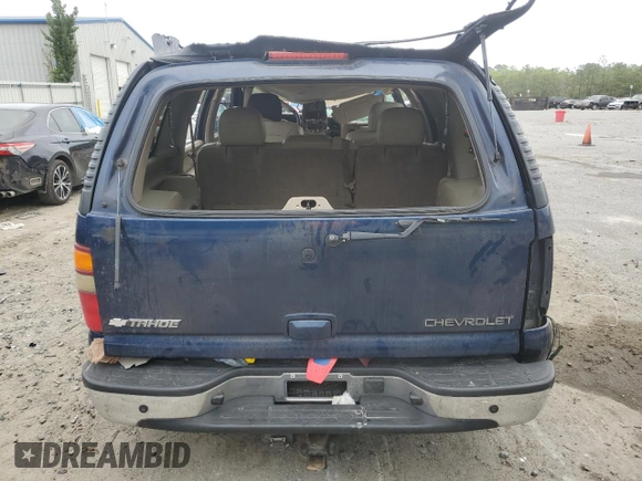 2003 Chevrolet Tahoe Z71 z VIN 1GNEK13Z63R303291, wystawiony jako Copart lot #51689825 z przebiegiem 192 372 mil mil oraz Szkoda całkowita • Salvage title. Historia ofert i sprzedaży dostępna na DreamBid. Obrazek 6.