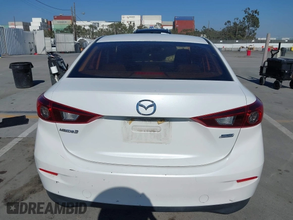 2015 Mazda 3 i SV with VIN JM1BM1T71F1218642, listed as a IAAI auction lot 42142795 with 134,143 mi miles. Bid and sale history available at carsss.com. Image 16.