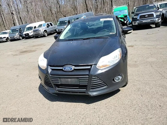 2014 Ford Focus SE with VIN 1FADP3F29EL297594, listed as a Copart auction lot 53249755 with 207,713 mi miles and Salvage Title. Bid and sale history available at carsss.com. Image 13.