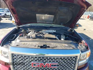 2017 GMC Sierra 2500HD Denali z VIN 1GT12UEY0HF186720, wystawiony jako IAAI lot #41580466 z przebiegiem Nie podano mil oraz . Historia ofert i sprzedaży dostępna na DreamBid. Obrazek 10.