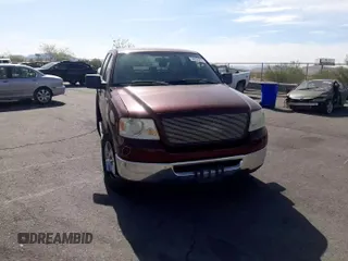 2006 Ford F-150 XLT with VIN 1FTPW12556KB24158, listed as a Copart auction lot 58204215 with 156,338 mi miles and Salvage title. Bid and sale history available at DreamBid. Image 11.