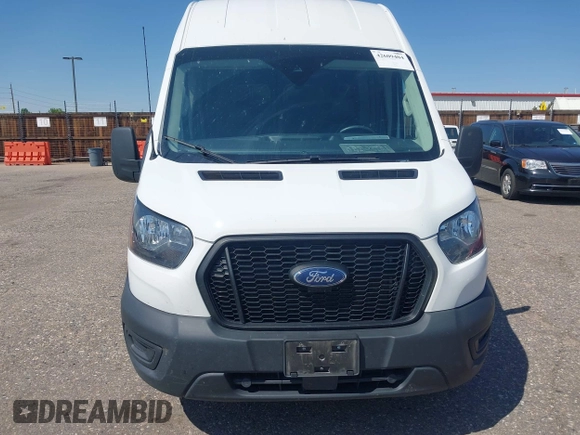 2023 Ford Transit Cargo with VIN 1FTBR1X80PKB45974, listed as a IAAI auction lot 42609404 with 35,940 mi miles and . Bid and sale history available at DreamBid. Image 12.