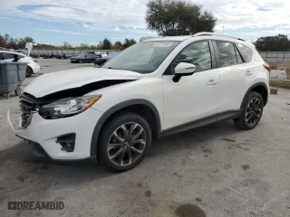 2016 Mazda CX-5 Grand Touring with VIN JM3KE2DY2G0870582, listed as a Copart auction lot 88771495 with 0 mi miles and Salvage Title. Bid and sale history available at carsss.com. Image 1.