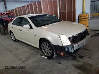 2007 Cadillac STS z VIN 1G6DW677170153246, wystawiony jako Copart lot #59531015 z przebiegiem 65 092 mil mil oraz Szkoda całkowita • Salvage title. Historia ofert i sprzedaży dostępna na DreamBid. Obrazek 4.