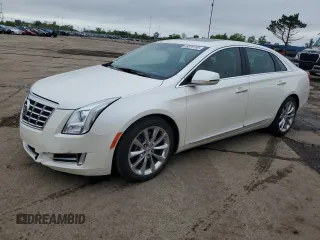2014 Cadillac XTS Premium z VIN 2G61R5S37E9201134, wystawiony jako Copart lot #56878185 z przebiegiem 43 036 mil mil oraz Nie do naprawy • Non repairable. Historia ofert i sprzedaży dostępna na DreamBid. Obrazek 1.