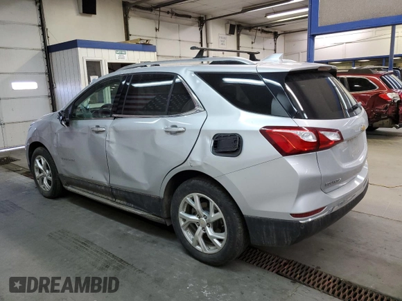 2020 Chevrolet Equinox Premier z VIN 2GNAXXEV3L6128099, wystawiony jako Copart lot #79041114 z przebiegiem 65 856 mil mil oraz Szkoda całkowita • Salvage title. Historia ofert i sprzedaży dostępna na DreamBid. Obrazek 2.