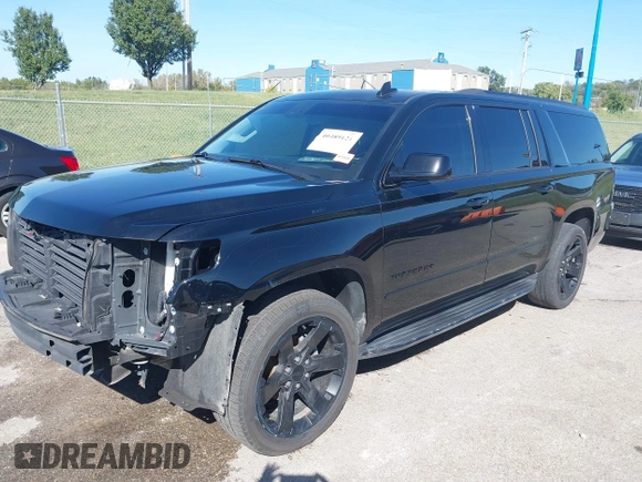 2019 Chevrolet Suburban Premier with VIN 1GNSKJKJ1KR100936, listed as a IAAI auction lot 40489121 with 97,884 mi miles and . Bid and sale history available at DreamBid. Image 23.