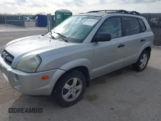 2006 Hyundai Tucson GL with VIN KM8JM12BX6U469719, listed as a IAAI auction lot 41899134 with 136,179 mi miles. Bid and sale history available at carsss.com. Image 6.