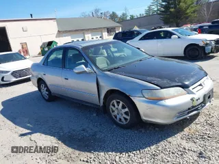 2002 Honda Accord SE z VIN 1HGCG66862A056953, wystawiony jako IAAI lot #42077572 z przebiegiem 168 427 mil mil oraz . Historia ofert i sprzedaży dostępna na DreamBid. Obrazek 1.