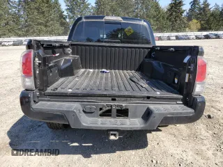 2018 Toyota Tacoma SR with VIN 3TMGZ5AN6JM163097, listed as a Copart auction lot 52633665 with 39,910 mi miles and Salvage Title. Bid and sale history available at DreamBid. Image 6.