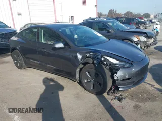 2023 Tesla Model 3 with VIN 5YJ3E1EA5PF697201, listed as a IAAI auction lot 41589422 with 16,862 mi miles. Bid and sale history available at carsss.com. Image 1.