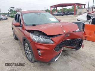 2020 Ford Escape Titanium Hybrid z VIN 1FMCU0DZ1LUB13684, wystawiony jako IAAI lot #41629782 z przebiegiem 31 669 mil mil oraz . Historia ofert i sprzedaży dostępna na DreamBid. Obrazek 1.