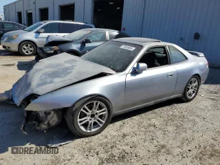 2000 Honda Prelude with VIN JHMBB6148YC005916, listed as a Copart auction lot 77824604 with 171,072 mi miles and Salvage Title. Bid and sale history available at DreamBid. Image 1.