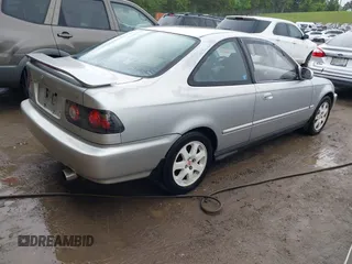 1997 Honda Civic EX z VIN 1HGEJ8144VL050538, wystawiony jako IAAI lot #42118882 z przebiegiem 384 347 mil mil oraz . Historia ofert i sprzedaży dostępna na DreamBid. Obrazek 4.