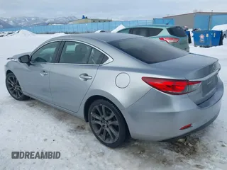 2014 Mazda Mazda6 i Touring with VIN JM1GJ1V62E1134427, listed as a IAAI auction lot 41550411 with 112,804 mi miles. Bid and sale history available at carsss.com. Image 3.