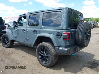 2024 Jeep Wrangler Sahara with VIN 1C4RJXP68RW270112, listed as a IAAI auction lot 42193921 with 23,792 mi miles and . Bid and sale history available at carsss.com. Image 3.