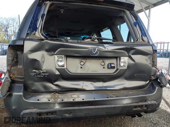 2007 Honda Pilot EX-L with VIN 5FNYF18777B012649, listed as a IAAI auction lot 42070873 with 167,419 mi miles and . Bid and sale history available at DreamBid. Image 6.