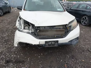2014 Honda CR-V LX with VIN 5J6RM4H30EL088372, listed as a IAAI auction lot 42171542 with 70,418 mi miles and . Bid and sale history available at carsss.com. Image 17.