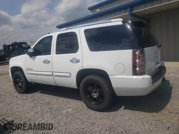2007 GMC Yukon Denali z VIN 1GKFK63817J345216, wystawiony jako Copart lot #52853275 z przebiegiem 245 524 mil mil oraz Szkoda całkowita • Salvage title. Historia ofert i sprzedaży dostępna na DreamBid. Obrazek 2.