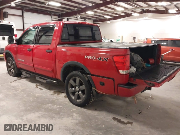 2012 Nissan Titan SV with VIN 1N6AA0EC7CN327973, listed as a IAAI auction lot 41841596 with 148,519 mi miles. Bid and sale history available at carsss.com. Image 3.