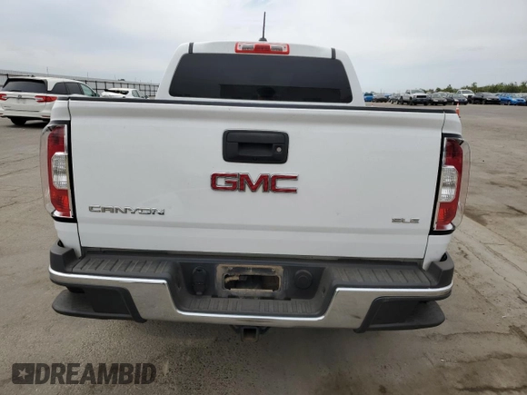 2016 GMC Canyon 2WD SLE with VIN 1GTG5CE39G1375068, listed as a Copart auction lot 65466624 with 114,696 mi miles and Salvage Title. Bid and sale history available at carsss.com. Image 6.