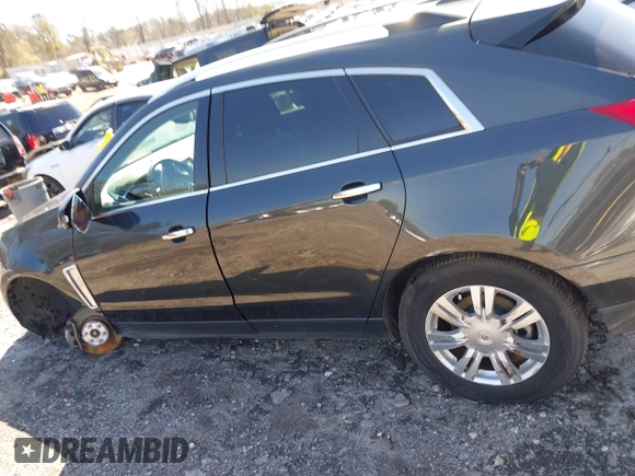 2015 Cadillac SRX Luxury Collection with VIN 3GYFNBE36FS537297, listed as a IAAI auction lot 41733421 with 147,336 mi miles. Bid and sale history available at carsss.com. Image 14.