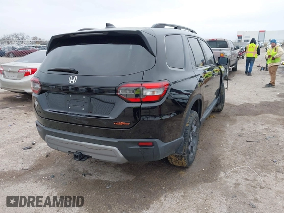 2023 Honda Pilot TrailSport with VIN 5FNYG1H63PB051646, listed as a IAAI auction lot 41069614 with 28,730 mi miles. Bid and sale history available at carsss.com. Image 4.