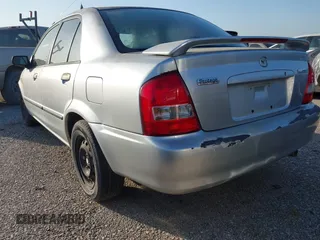 2001 Mazda Protege DX with VIN JM1BJ222810410482, listed as a IAAI auction lot 40799727 with 159,446 mi miles and . Bid and sale history available at DreamBid. Image 16.