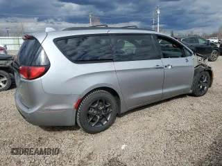 2018 Chrysler Pacifica Touring L with VIN 2C4RC1BGXJR194588, listed as a Copart auction lot 53236885 with 149,968 mi miles and Salvage Title. Bid and sale history available at DreamBid. Image 3.