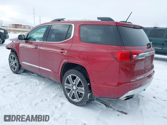2019 GMC Acadia Denali with VIN 1GKKNXLS2KZ149738, listed as a IAAI auction lot 41213851 with 73,847 mi miles and . Bid and sale history available at carsss.com. Image 3.