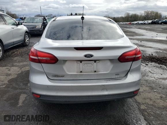 2016 Ford Focus SE with VIN 1FADP3F27GL230723, listed as a Copart auction lot 45467755 with 140,095 mi miles and Salvage title. Bid and sale history available at DreamBid. Image 6.