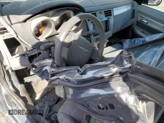 2007 Chrysler Sebring Touring z VIN 1C3LC56K87N551675, wystawiony jako Copart lot #52526495 z przebiegiem 101 152 mil mil oraz Szkoda całkowita • Salvage title. Historia ofert i sprzedaży dostępna na DreamBid. Obrazek 13.