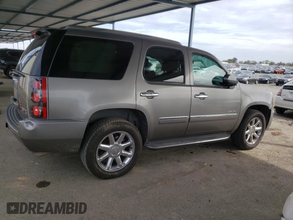 2012 GMC Yukon Denali with VIN 1GKS1EEFXCR236823, listed as a Copart auction lot 49830405 with 134,568 mi miles and Salvage Title. Bid and sale history available at carsss.com. Image 3.