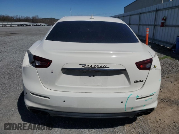 2019 Maserati Ghibli с VIN ZAM57XSA5K1335540, выставлен на аукционе Copart как лот 41641315 с пробегом 51 273 миль миль и Списание • Salvage title. История ставок и продаж доступна на DreamBid. Изображение 6.
