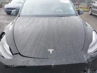 2021 Tesla Model Y Performance z VIN 5YJYGDEF2MF215938, wystawiony jako IAAI lot #41338287 z przebiegiem 63 925 mil mil oraz . Historia ofert i sprzedaży dostępna na DreamBid. Obrazek 10.