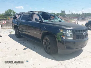 2015 Chevrolet Suburban LT with VIN 1GNSCJKCXFR201817, listed as a IAAI auction lot 41946288 with 239,256 mi miles and . Bid and sale history available at DreamBid. Image 1.