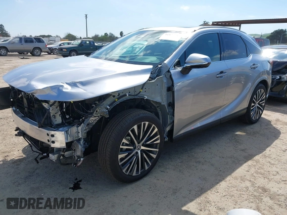 2024 Lexus RX with VIN 2T2BBMCA2RC059807, listed as a IAAI auction lot 41877717 with 3,284 mi miles. Bid and sale history available at carsss.com. Image 2.