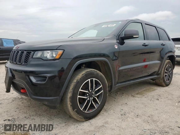 2019 Jeep Grand Cherokee Trailhawk with VIN 1C4RJFLG8KC613582, listed as a Copart auction lot 62901405 with 136,809 mi miles and Salvage title. Bid and sale history available at DreamBid. Image 1.