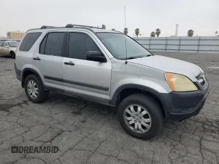 2002 Honda CR-V LX with VIN JHLRD684X2C024784, listed as a Copart auction lot 52049605 with 242,438 mi miles and Salvage Title. Bid and sale history available at carsss.com. Image 4.