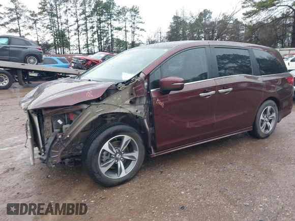 2019 Honda Odyssey Touring with VIN 5FNRL6H82KB060023, listed as a IAAI auction lot 41451199 with 82,994 mi miles. Bid and sale history available at carsss.com. Image 2.
