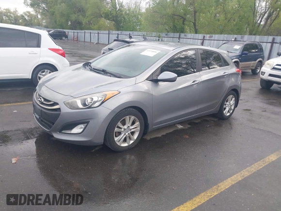 2014 Hyundai Elantra GT with VIN KMHD35LH1EU215003, listed as a IAAI auction lot 42154051 with 109,759 mi miles. Bid and sale history available at carsss.com. Image 2.