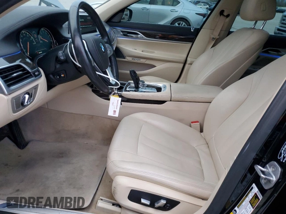 2018 BMW 7 Series 740i xDrive with VIN WBA7E4C50JGV23975, listed as a Copart auction lot 82354264 with 63,657 mi miles and Salvage Title. Bid and sale history available at carsss.com. Image 7.