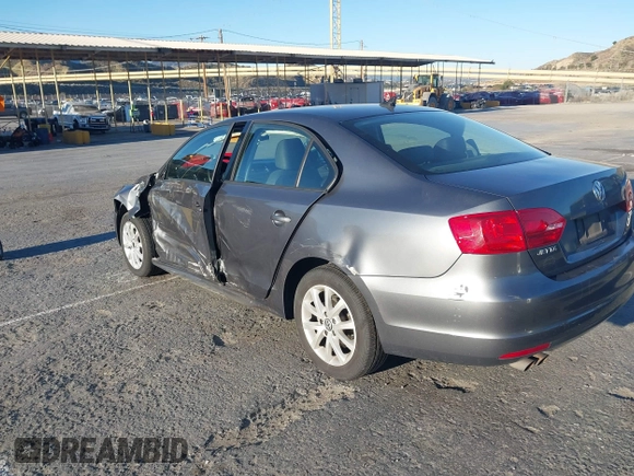 2012 Volkswagen Jetta Sedan SE w/Convenience with VIN 3VWDX7AJ7CM412976, listed as a IAAI auction lot 41823799 with 210,248 mi miles. Bid and sale history available at carsss.com. Image 3.