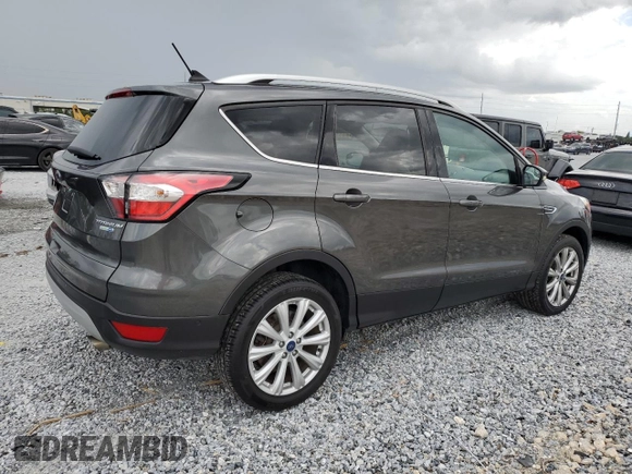 2018 Ford Escape Titanium with VIN 1FMCU9J90JUA75550, listed as a Copart auction lot 63339315 with Not provided miles and Clean title. Bid and sale history available at DreamBid. Image 3.