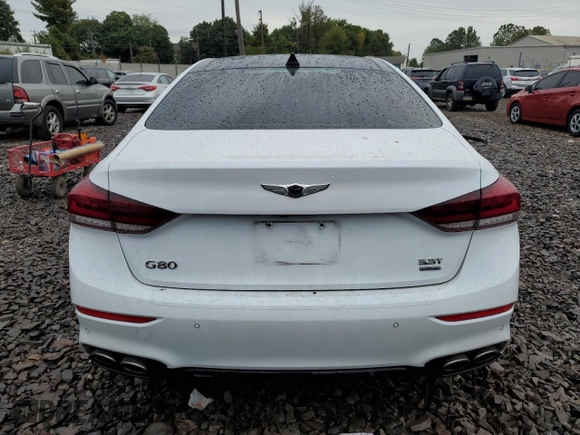 2018 Genesis G80 3.3T Sport with VIN KMHGN4JB3JU248921, listed as a Copart auction lot 71305654 with 73,718 mi miles and Salvage Title. Bid and sale history available at carsss.com. Image 6.