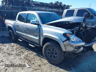 2023 Toyota Tacoma 4WD SR with VIN 3TMCZ5AN2PM615392, listed as a IAAI auction lot 41364313 with 22,628 mi miles. Bid and sale history available at carsss.com. Image 1.